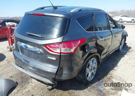 2015 Ford Escape Titanium z USA, uszkodzony, nr VIN 1FMCU0J90FUC10514